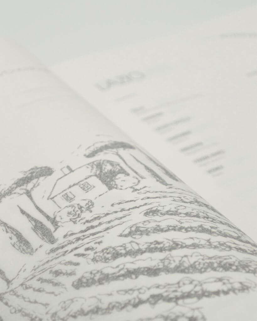 Una pagina interna aperta: l'illustrazione al tratto di una casa fra i campi e, a destra, le righe del menù con i prezzi, Pulejo, Lion Brand