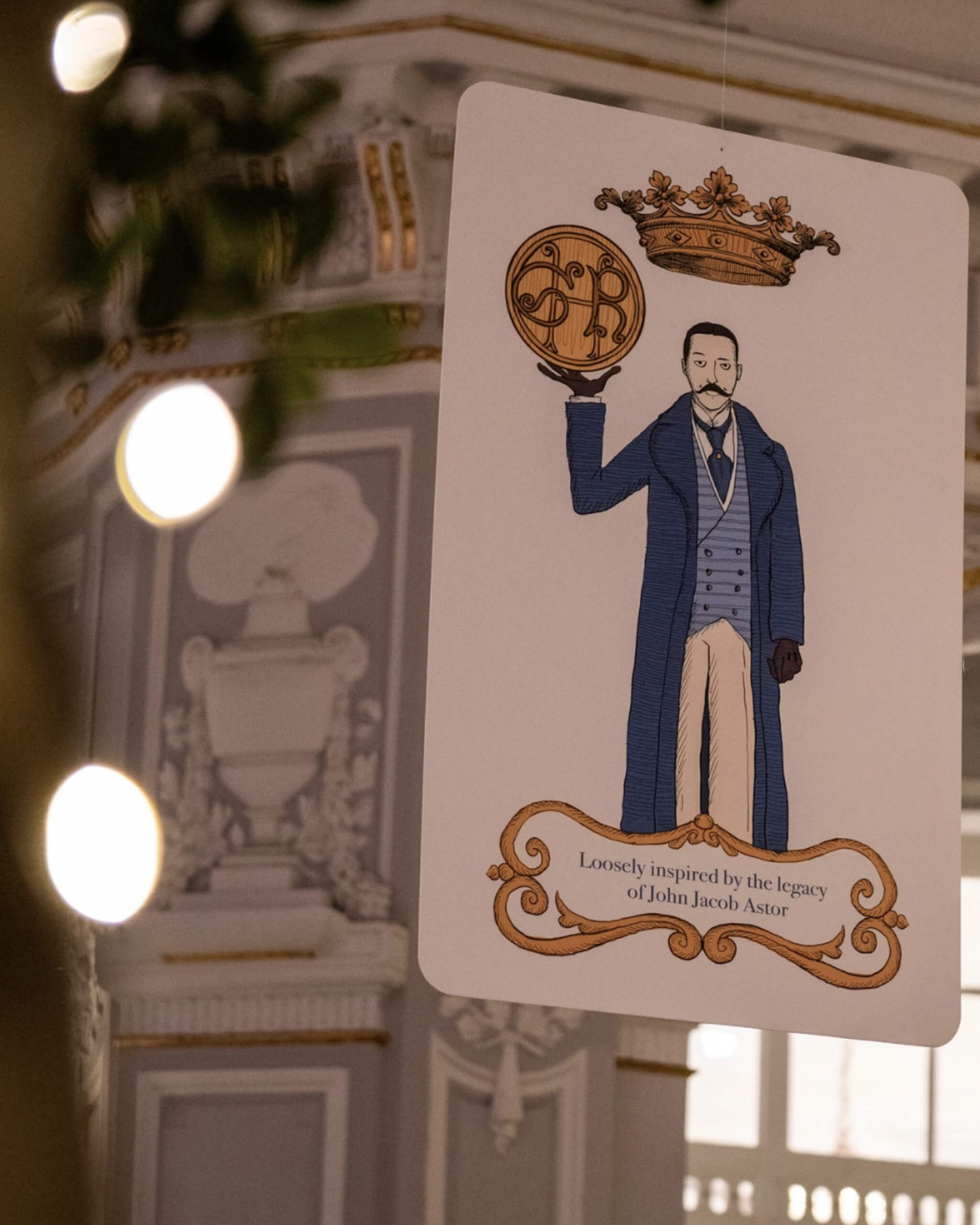 Carta da gioco sospesa nella hall del St. Regis, Lion Brand