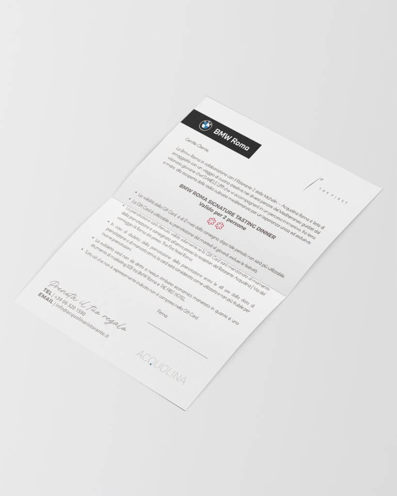 La lettera su carta intestata BMW Roma, con il titolo «BMW Roma Signature Tasting Dinner valido per 2 persone», The First e BMW Roma, Lion Brand